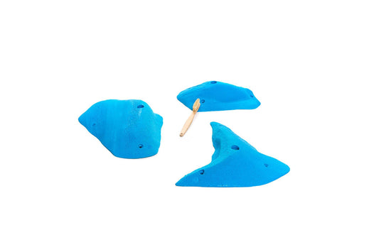 Three large textured climbing holds in a sky blue colour.